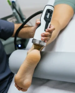 Shockwave machine treating Achilles Tendinopathy